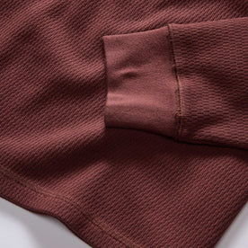 material shot of the ribbed cuffs on The Organic Cotton Waffle Henley in Burgundy