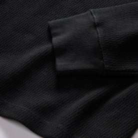 material shot of the rubbed cuff on The Organic Cotton Waffle Henley in Coal