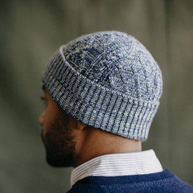fit model showing the back of The Orr Beanie in Marled Indigo
