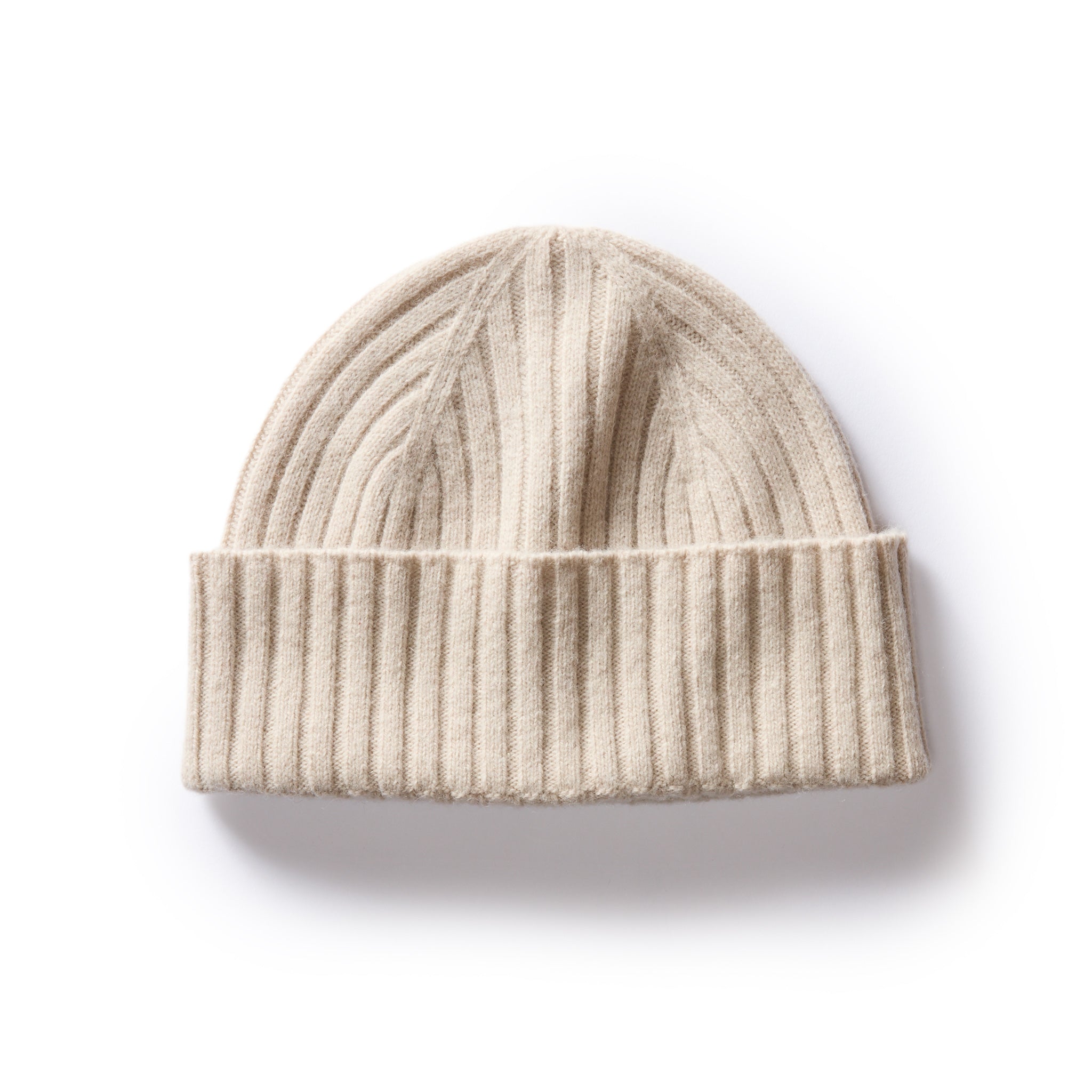 flatlay of The Rib Beanie in Oat Heather, Accessories by Taylor Stitch