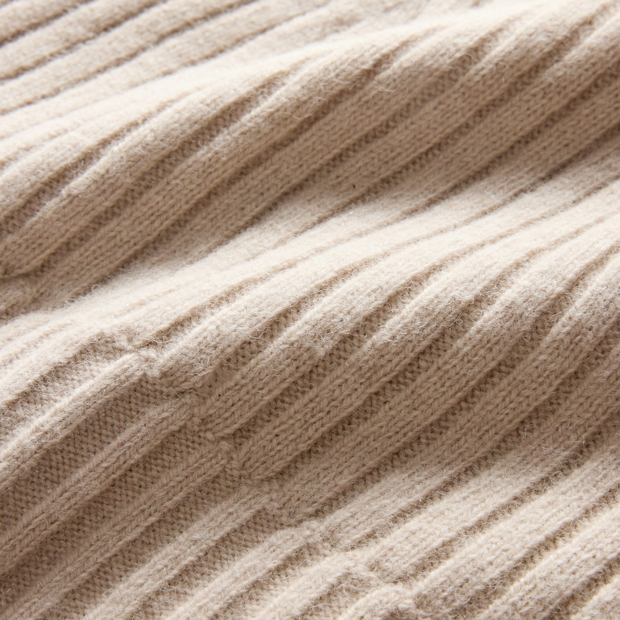material shot of the texture on The Rib Beanie in Oat Heather, Accessories by Taylor Stitch