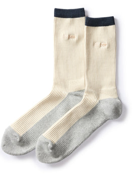 flatlay of The Ribbed Sock in Natural, Accessories by Taylor Stitch