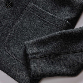 material shot of the pocket on The Ridgewood Cardigan in Charcoal Birdseye Wool