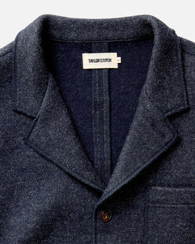 fit model standing by the doorway in The Ridgewood Cardigan in Navy Birdseye Wool, Outerwear by Taylor Stitch