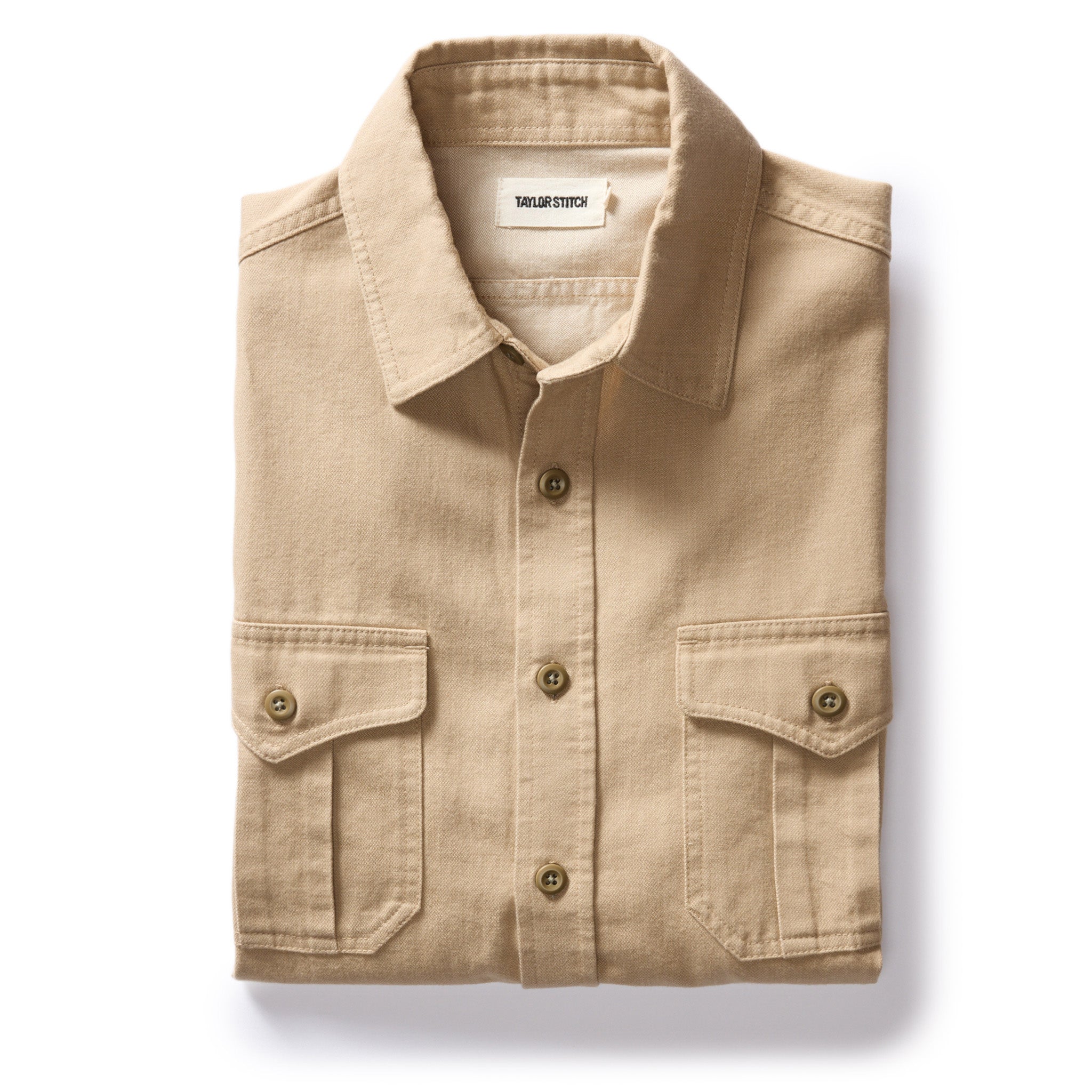 flatlay of The Saddler Shirt in Light Khaki Twill, Wovens by Taylor Stitch