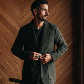 fit model buttoning The Sheffield Sportcoat in Forest Moleskin