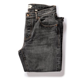 flatlay of The Slim Jean in Black 1-Year Wash Selvage Denim