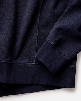 material shot of the hem on The Apres Crew in Indigo Terry, Knits by Taylor Stitch