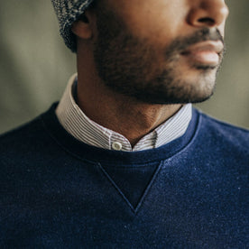fit model showing the collar on The Apres Crew in Indigo Terry