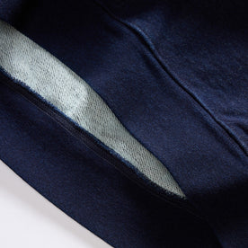 material shot of the hem on The Apres Hoodie in Indigo Terry