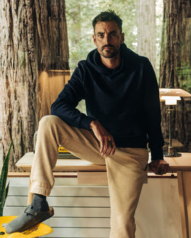 fit model in The Apres Hoodie in Indigo Terry, Knits by Taylor Stitch