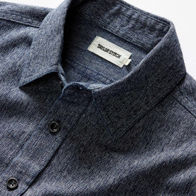 material shot of the collar on The Utility Shirt in Rinsed Indigo Herringbone