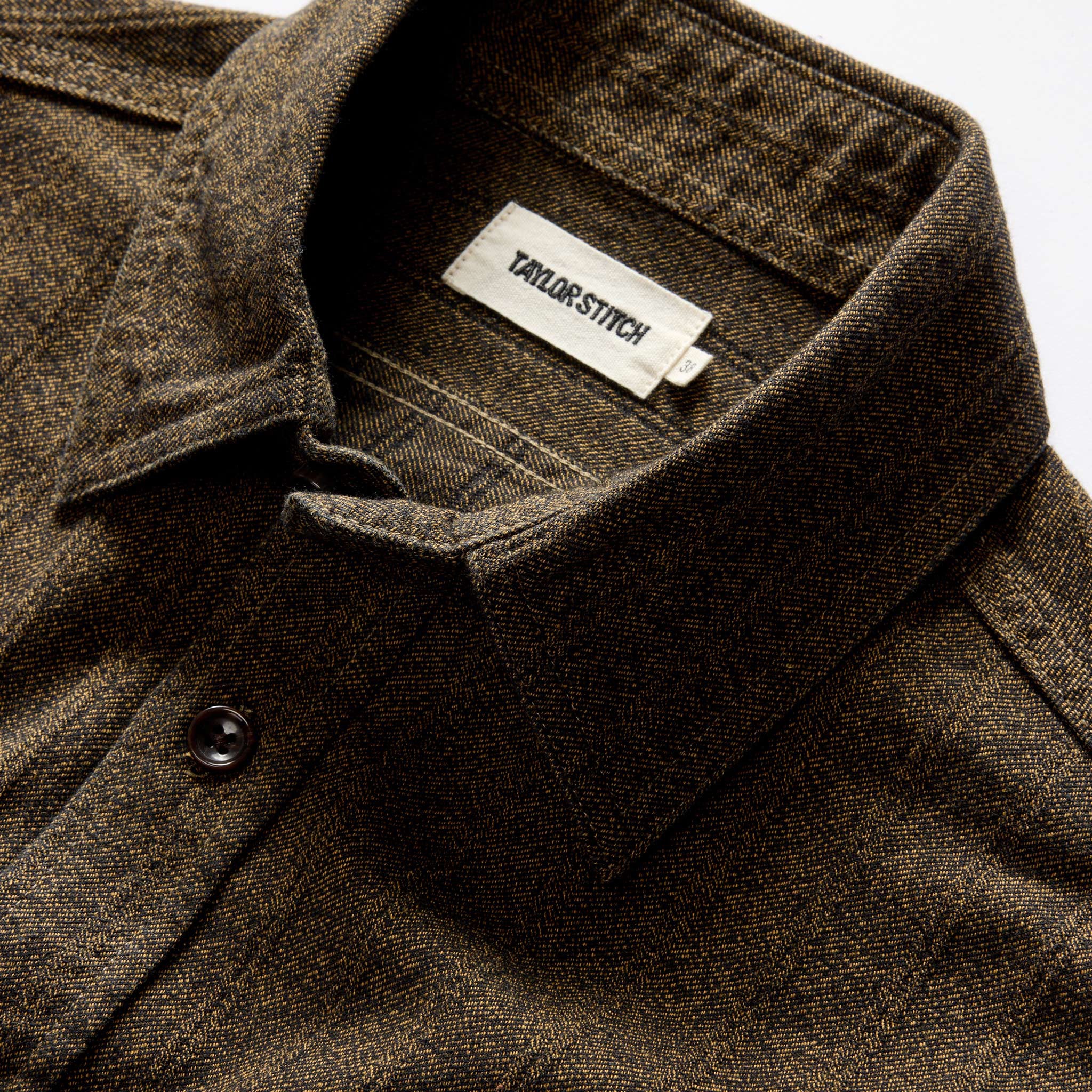 material shot of the collar on The Utility Shirt in Tarnished Brass Herringbone, Wovens by Taylor Stitch