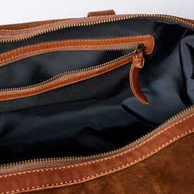 material shot of the zipper pocket on The Weekender Duffle in Chocolate Roughout