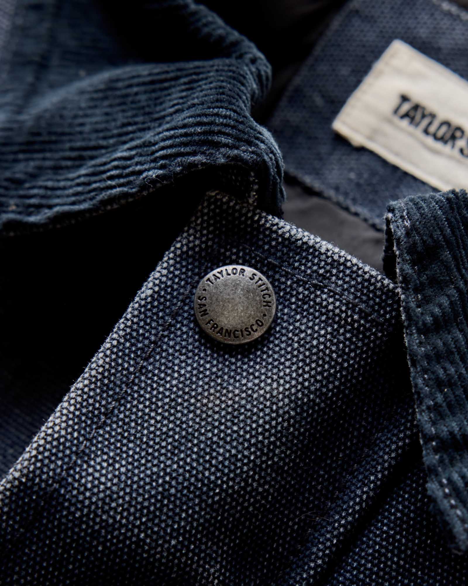flatlay of The Workhorse Jacket in Navy Chipped Canvas, shown open, Outerwear by Taylor Stitch