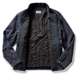 flatlay of The Workhorse Jacket in Navy Chipped Canvas, shown open