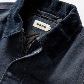 material shot of the corduroy collar on The Workhorse Jacket in Navy Chipped Canvas