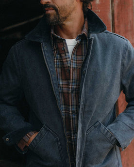 fit model showing the side pockets on The Workhorse Jacket in Navy Chipped Canvas, Outerwear by Taylor Stitch