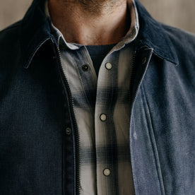 fit model showing the front of The Workhorse Jacket in Navy Chipped Canvas