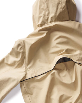 material shot of the back flap on The Chapman Anorak in Light Khaki, Outerwear by Taylor Stitch