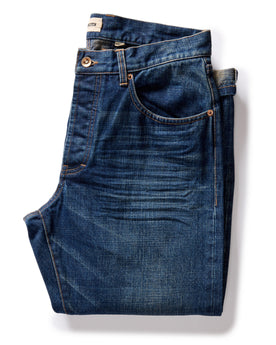 flatlay of The Democratic Brushed Back Jean in Collins Resin Wash Selvage Denim, Bottoms by Taylor Stitch