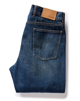 flatlay of The Democratic Brushed Back Jean in Collins Resin Wash Selvage Denim, folded from back, Bottoms by Taylor Stitch