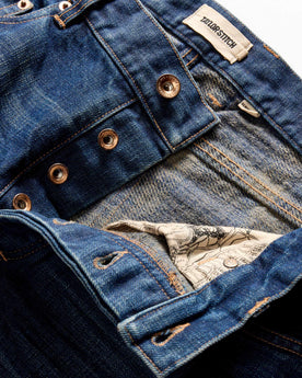 material shot of the button fly on The Democratic Brushed Back Jean in Collins Resin Wash Selvage Denim, Bottoms by Taylor Stitch