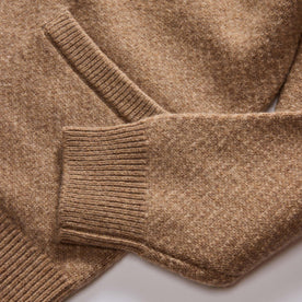 material shot of the ribbed cuff on The Eddy Cardigan in Camel Herringbone Merino