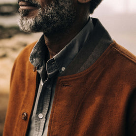 fit model showing the collar on The Bomber Jacket in Tarnished Copper Moleskin