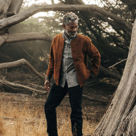 fit model walking in The Bomber Jacket in Tarnished Copper Moleskin