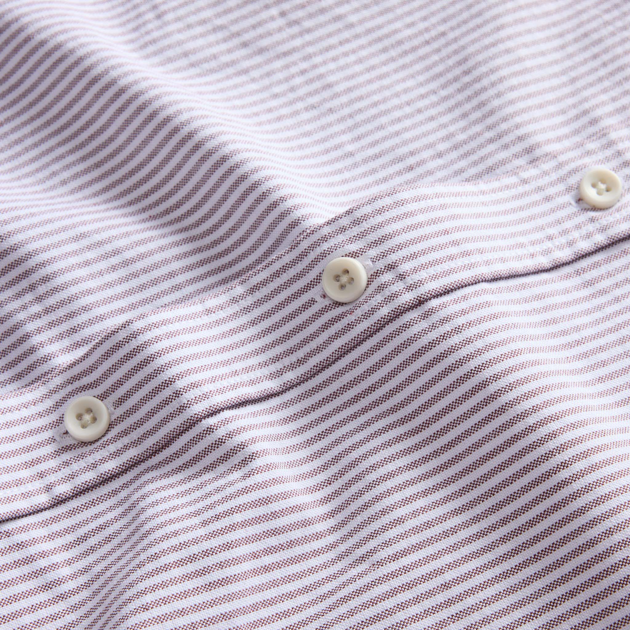 material shot of the buttons on The Jack in Burgundy University Stripe Oxford, Wovens by Taylor Stitch