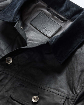 material shot of the collar on The Long Haul Jacket in Coal Waxed Canvas, Outerwear by Taylor Stitch