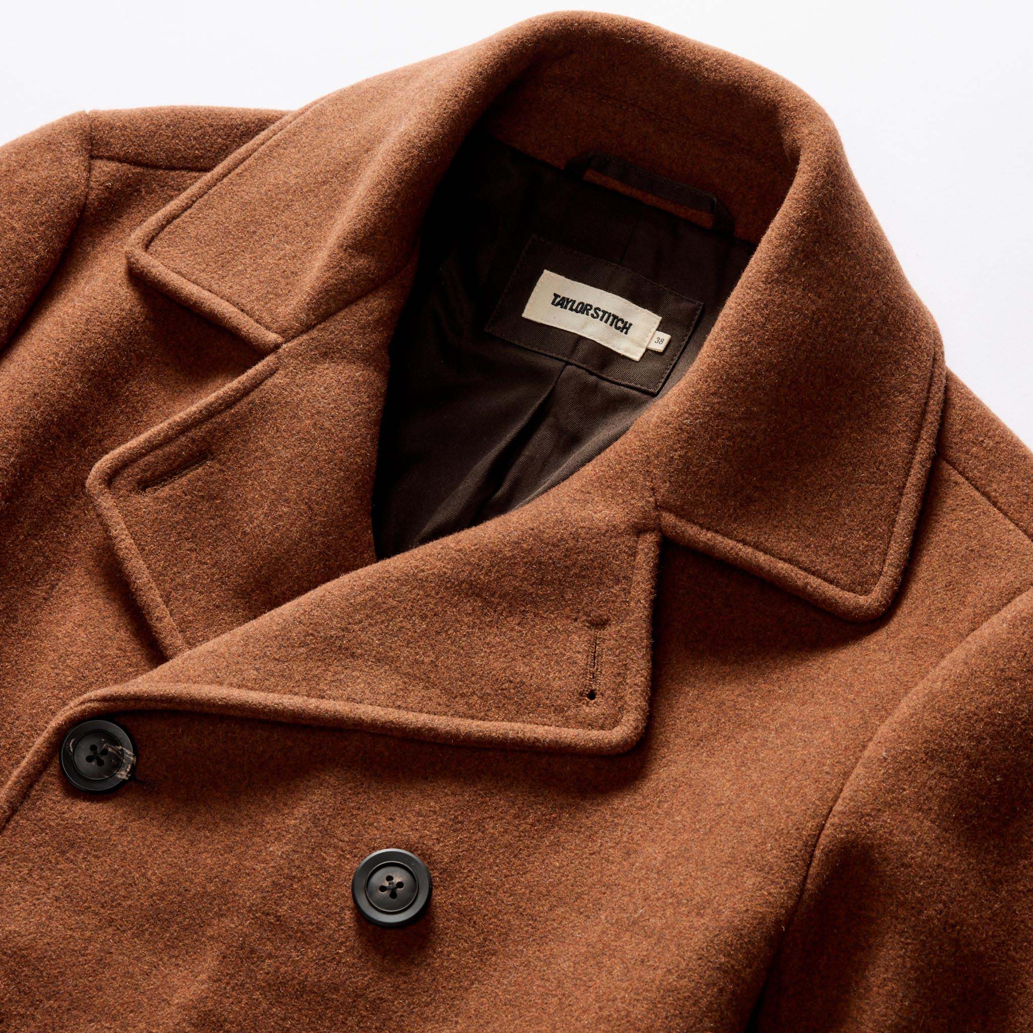material shot of the double breasted front of The Mariner Coat in Tarnished Copper Wool, Outerwear by Taylor Stitch