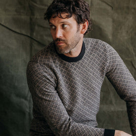 fit model showing the front of The Otto Sweater in Coal Merino