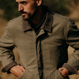 fit model with his hands in the pockets of The Workhorse Jacket in Stone Boss Duck