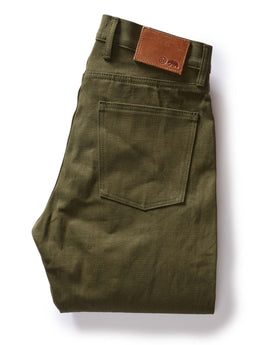 folded flatlay of the back of The Slim Jean in Olive Nihon Menpu Selvage, Bottoms by Taylor Stitch