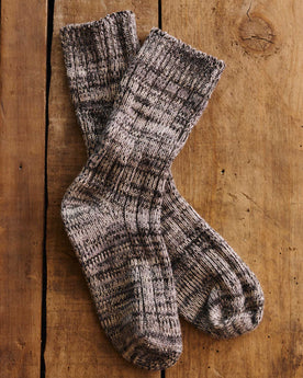 editorial flatlay of The Camp Sock in Marled Charcoal, Accessories by Taylor Stitch