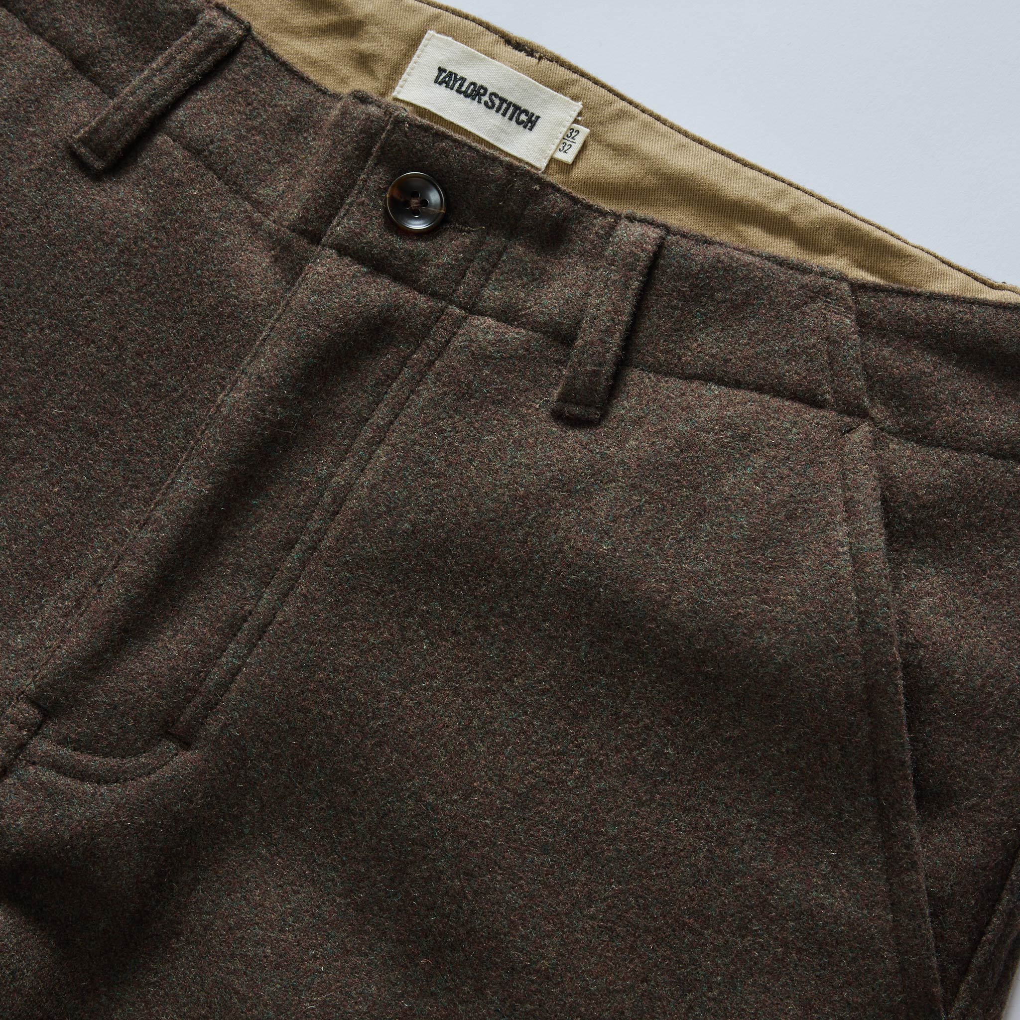 material shot of the waistband on The Carnegie Pant in Army Herringbone Wool, Bottoms by Taylor Stitch