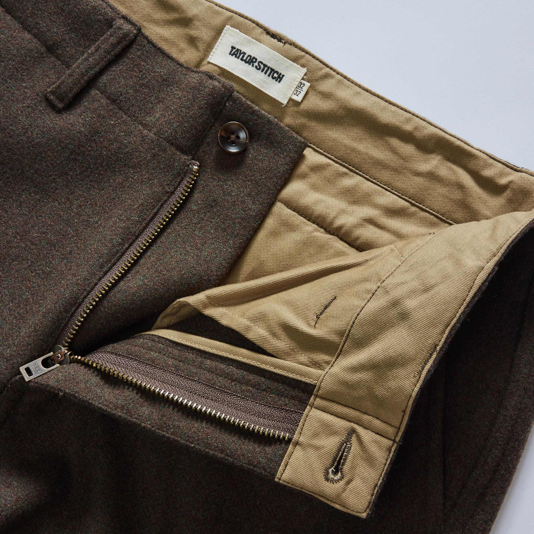 material shot of the zipper fly on The Carnegie Pant in Army Herringbone Wool, Bottoms by Taylor Stitch