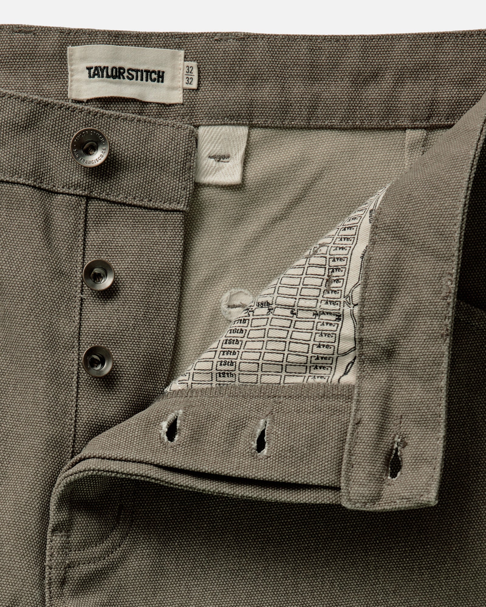 material shot of the button fly on The Chore Pant in Stone Chipped Canvas, Bottoms by Taylor Stitch