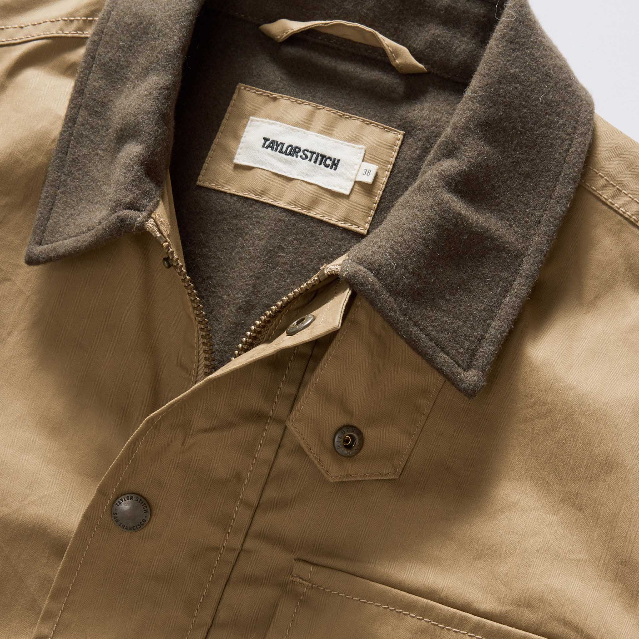 material shot of the collar on The Deck Jacket in Khaki Dry Wax, Outerwear by Taylor Stitch