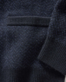 material shot of the sleeve on The Eddy Cardigan in Heather Marine Herringbone, Knits by Taylor Stitch