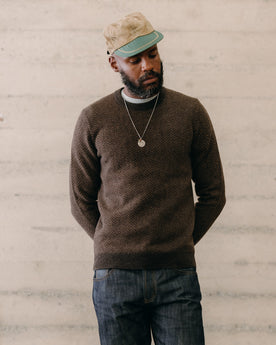 fit model sitting wearing The Eddy Crew in Coffee Herringbone, Knits by Taylor Stitch