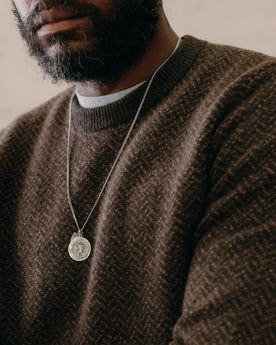 fit model posing in The Eddy Crew in Coffee Herringbone, Knits by Taylor Stitch