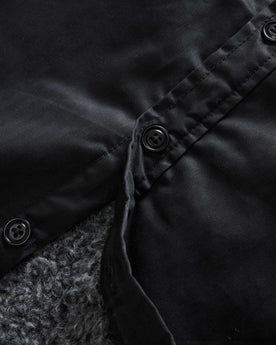 material shot of the buttons on The Fender Jacket in Coal Dry Wax, Outerwear by Taylor Stitch