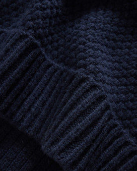 material shot of the hem on The Fisherman Sweater in Dark Navy Merino, Knits by Taylor Stitch