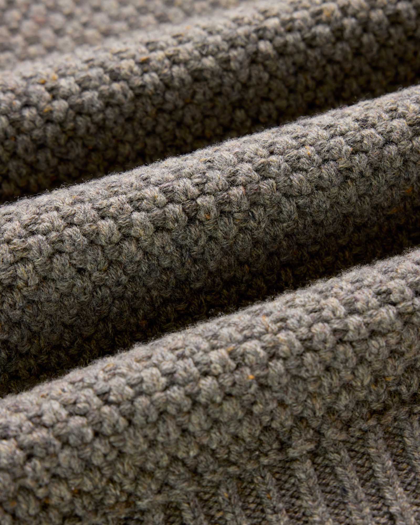 material shot of the hem on The Fisherman Sweater in Taupe Merino, Knits by Taylor Stitch