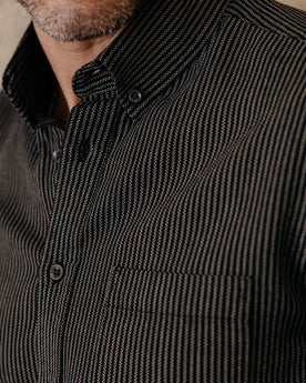 fit model showing off the collar on The Jack in Roped Black Indigo, Wovens by Taylor Stitch