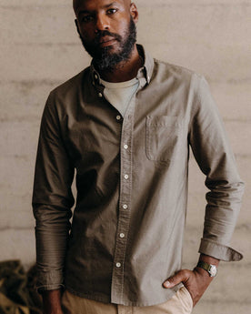 fit model posing in The Jack in Smoked Olive Oxford, Wovens by Taylor Stitch