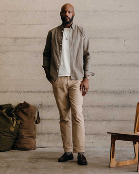fit model standing wearing The Jack in Smoked Olive Oxford, Wovens by Taylor Stitch